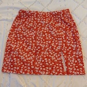 Orange and white floral mini skirt perfect for rush!